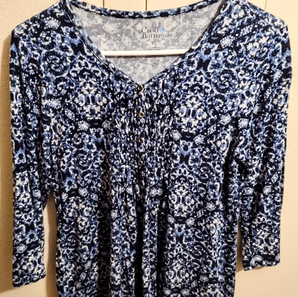 New condition, soft, knit top. Navy and light blue pattern, 3/4 sleeve.
